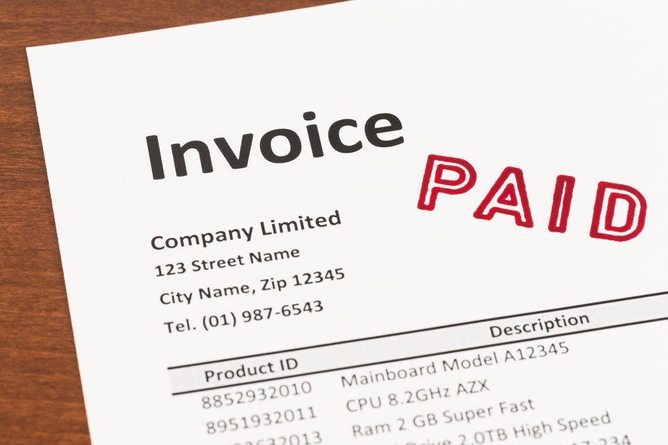 Invoice with paid stamp; invoice is mock-up